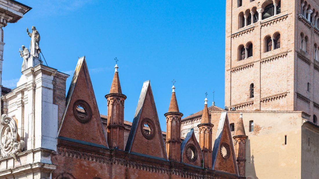 Gothic pinnacles and bell tower of Mantua Cathedral